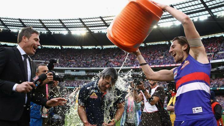 Cool down: Marcus Bontempelli celebrates with his coach Luke Beveridge. Photo: AFL Media/Getty Images