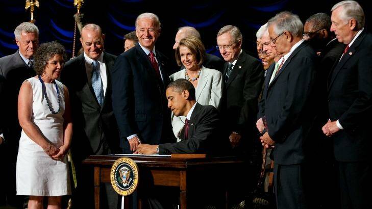 Then-president Barack Obama signed the Dodd-Frank Act in 2010.  Photo: New York Times
