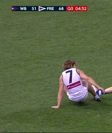 The incident: Nat Fyfe was reported for tripping Koby Stevens. Photo: Fox Footy