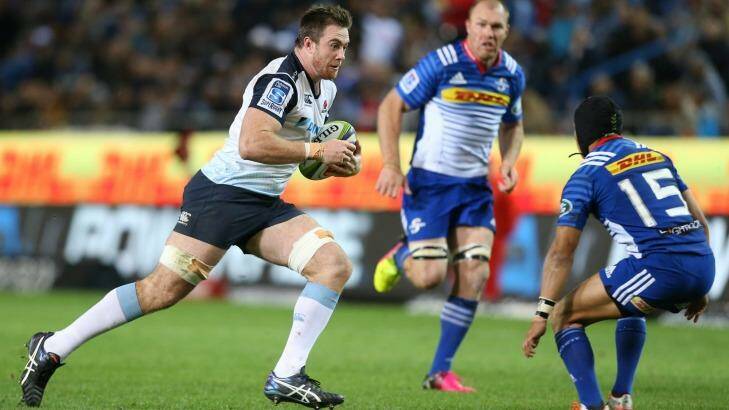 On the charge: Jed Holloway heads into the Stormers defence for the Waratahs at Newlands. Photo: Gallo Images