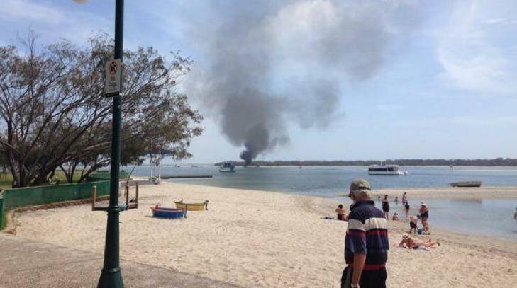 A boat on fire in the Gold Coast Broadwater.  Photo: Brendon Wolf, Nine News