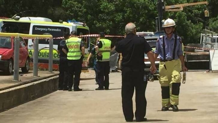 Emergency workers at the scene of a workplace accident at Cleveland. Photo: Cheryl Goodenough - Redland City Bulletin