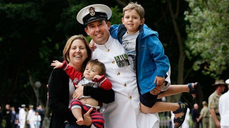 Chief Petty Officer Damian Tawlenko with wife Michelle and sons Cristian, 7, and Darcy, 21 months.  Photo: Lisa Maree Williams