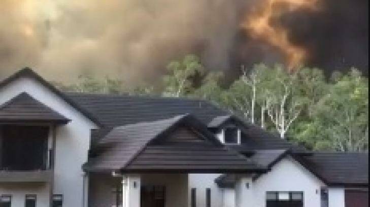 Fire crews continue to battle several bush fires as another emergency situation is declared for Coolum locals. Photo: Alison Ariotti