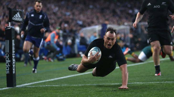 Hair-raising: Israel Dagg scores the opening try. Photo: Phil Walter