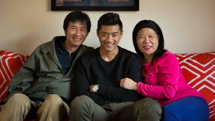 Lin Jong with his parents Vitor and Fay.  Photo: Simon Schluter