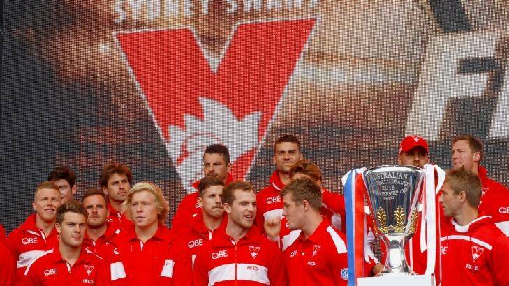 Continuing success story: the Swans after the 2016 grand final parade. Photo: Darrian Traynor