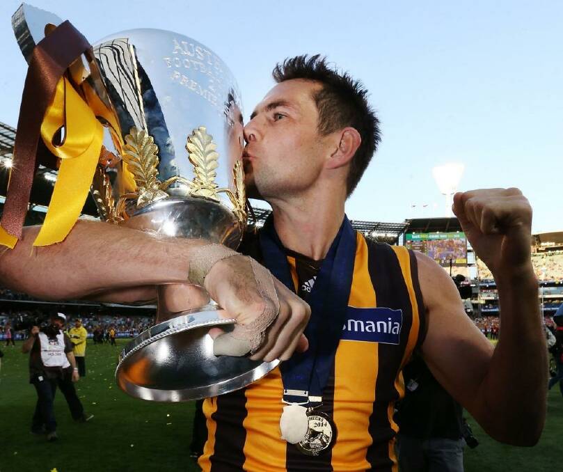 Luke Hodge wasn't the only one celebrating Hawthorn's epic AFL grand final win. Photo: Getty Images/Michael Dodge