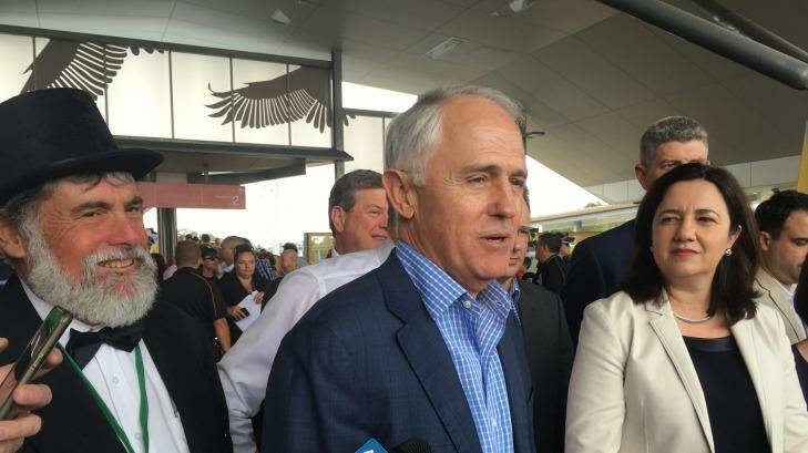 Moreton Bay Mayor Allan Sutherland, Prime Minister Malcolm Turnbull and Premier Annastacia Palaszczuk open the Moreton Bay Rail Link in October 2016.
A report in faulty signal software has still not been released. Photo: Cameron Atfield