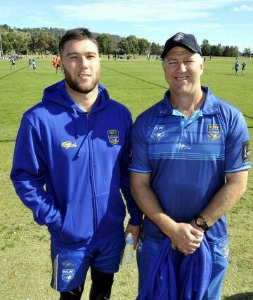Famous football family: Curtis Sironen and his dad Paul in City Origin camp ahead of today's match against Country Photo: Wagga Daily Advertiser
