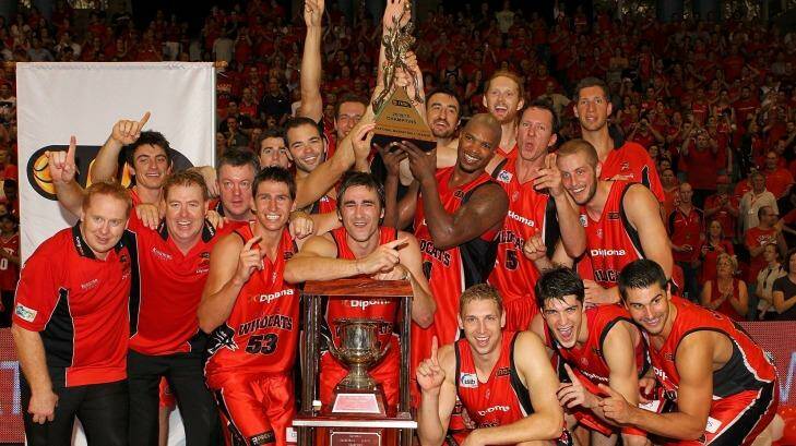 Championship pedigree: The Wildcats pose with the NBL trophy after defeating the Wollongong Hawks during game three of the 2010 grand final series in Perth. Photo: Paul Kane
