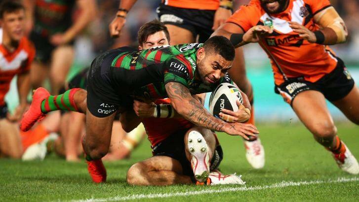 Prolific: Nathan Merritt scores against Wests Tigers.