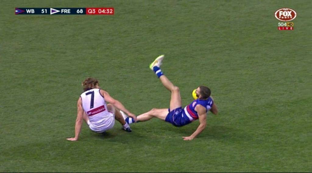The incident: Nat Fyfe was reported for tripping Koby Stevens. Photo: Fox Footy