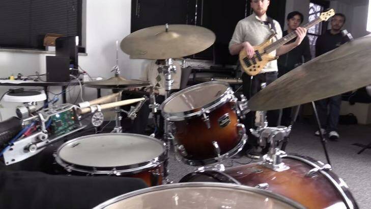 Jason Barnes' robot prosthesis allows him to drum faster than an able-bodied drummer. Photo: Screenshot