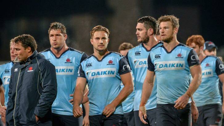 Dejected: The Waratahs following their 29-10 loss to the Crusaders in Christchurch. Photo: Kai Schwoerer/Getty Images