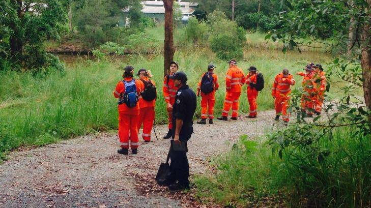 SES volunteers search the Gold Coast hinterland property for the remains of missing mother Novy Chardon.  Photo: Kim Stephens