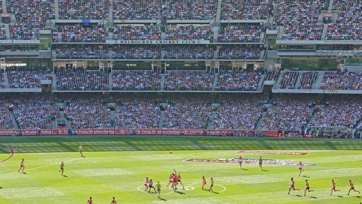 Several punters jumped in with huge bets on both the Swans and the Hawks just prior to the bounce in the AFL grand final. Photo: Scott Barbour/Fairfax Media via Getty Images
