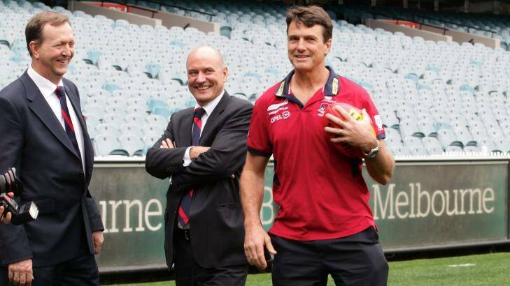 Peter Jackson, left, Glen Bartlett, centre, and Paul Roos at the announcement of Roos as Demons coach in 2013. Photo: Angela Wylie 