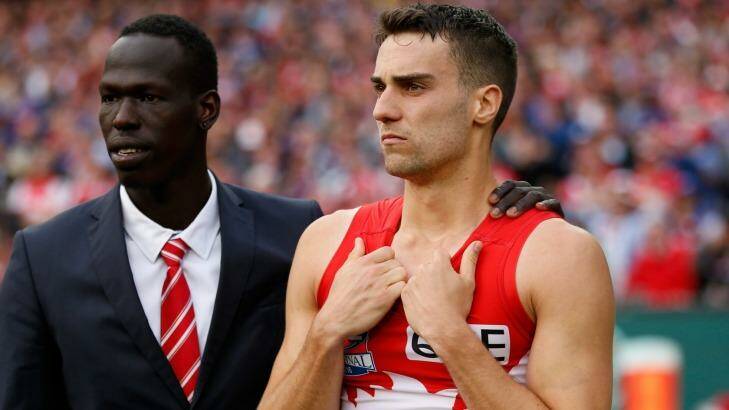 Xavier Richards and Aliir Aliir commiserate after this year's grand final. Photo: Michael Willson/AFL Media