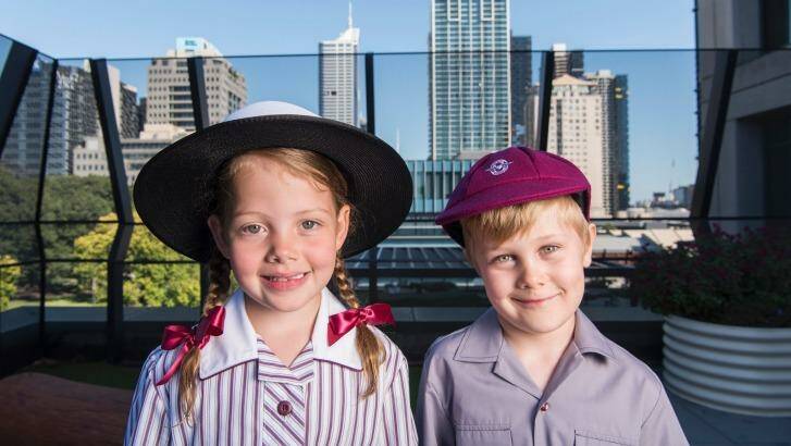Prep students Amali Melville and Tate Verhagen on the roof of the Haileybury campus in West Melbourne, which opened this week. Photo: Josh Robenstone