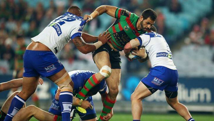 Hobbled: Greg Inglis was forced off with a knee injury. Photo: Getty Images 