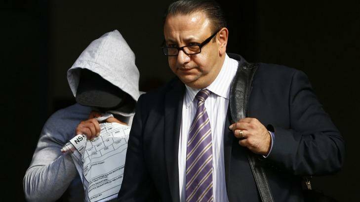 High profile: Elias Tabchouri leaves Bankstown Court with his client in the Condell Park shooting case in April. He is now representing  Semi Radradra's former partner, Perina Ting. Photo: Daniel Munoz