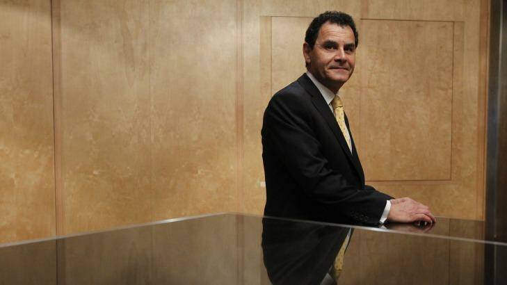 Sitting pretty: Medibank CEO George Savvides will get a $750,000 bonus for successfully completing the company's IPO. Photo: Louise Kennerley