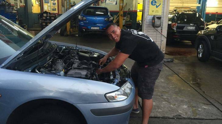 Hands on: Sio Siua Taukeiaho works as a car mechanic at West Ryde Service Centre. Photo: Supplied