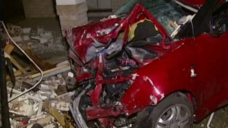 There were no injuries when a car was driven through a house in Brisbane. Photo: Nine News
