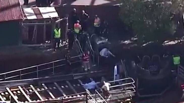 Paramedics rushed to the theme park with reports up to four people had died. Photo: Twitter / 7 News