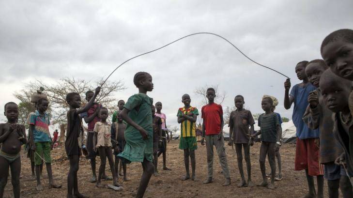 A file photo taken on April 2, 2014 shows children jumping rope in the Kule refugee camp near the Pagak Border Entry point in the Gambela Region of Ethiopia. Photo: AFP/Zacharias Abubeker