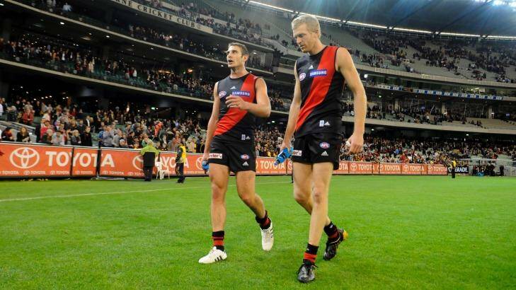 Jobe Watson and Dustin Fletcher may have to sit out an extra week of the home-and-away season if any suspension is backdated until the end of last season. Photo: Sebastian Costanzo