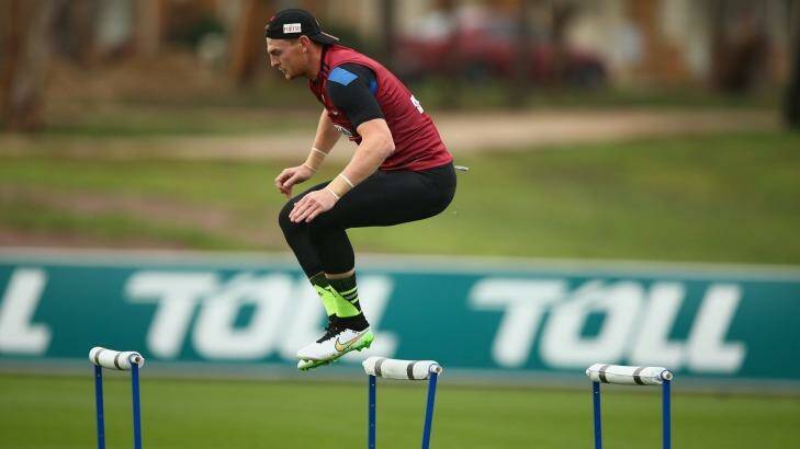 Essendon's Brendon Goddard leaps a hurdle during training on Friday. Photo: Robert Cianflone