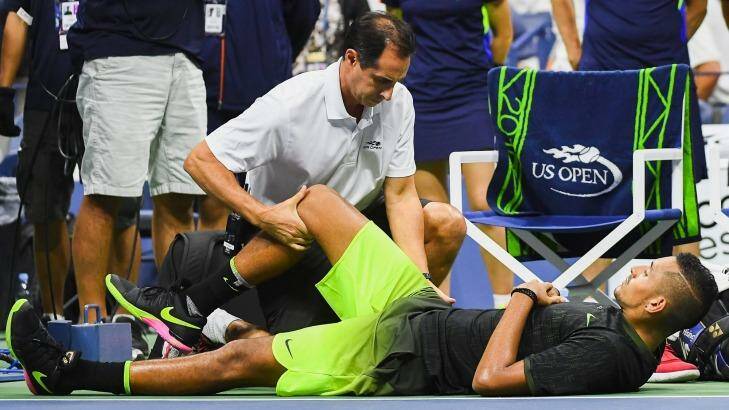 Abrupt end: Nick Kyrgios was forced to retire from his third-round match at the US Open due to a hip problem. Photo: Alex Goodlett
