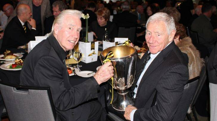 Tommy Hafey with Billy Barrot and the 1980 premiership cup. Photo: Peter Ward