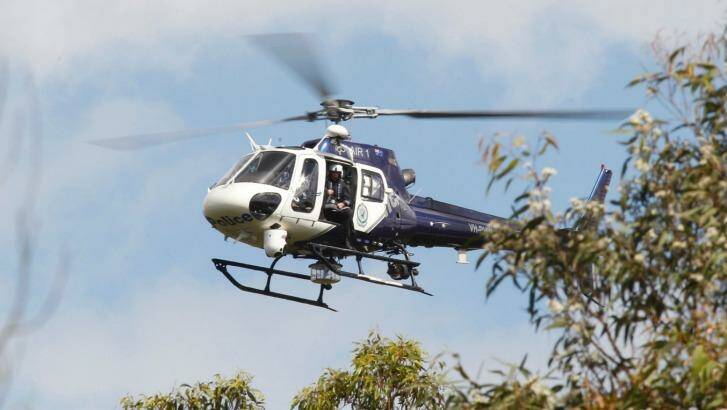 A middle-aged man shone a laser at a police helicopter patrolling on the Sunshine Coast.