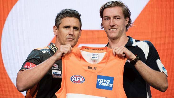 Giants coach Leon Cameron with number-five pick Will Setterfield at last year's draft.  Photo: Christopher Pearce