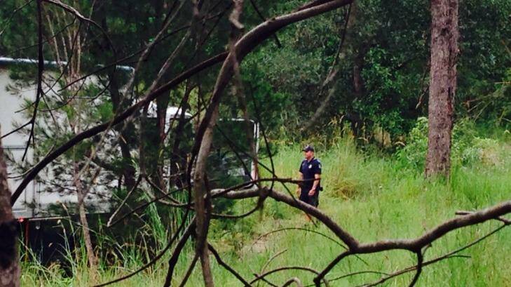 Police search for property in the Gold Coast Hinterland. Photo: Kim Stephens