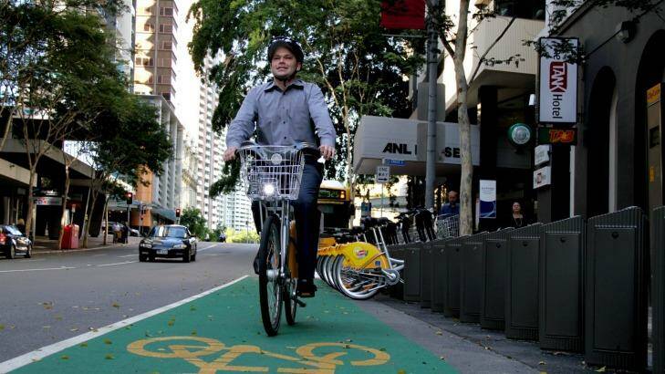 Deputy mayor Adrian Schrinner says Brisbane's inner-city, home of the CityCycle scheme, could benefit from voluntary helmet laws. Photo: Michelle Smith