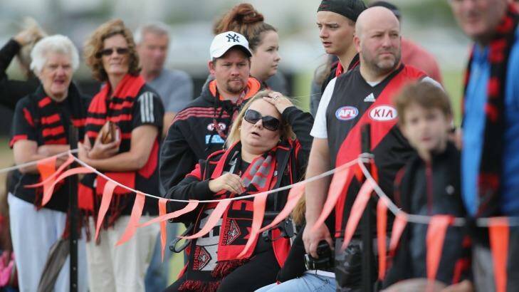 Standing by their club: Essendon fans on Thursday during the first Bombers training session since the CAS verdict was announced on Tuesday. Photo: Wayne Taylor
