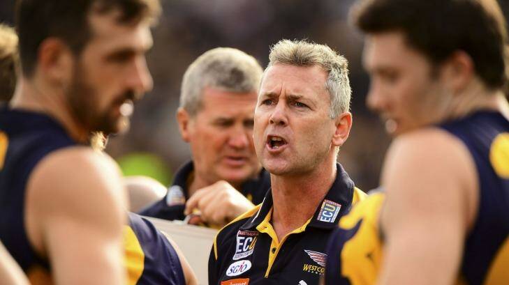 Wise counsel: Adam Simpson speaks to the team at quarter-time. Photo: AFL Media/Getty Images