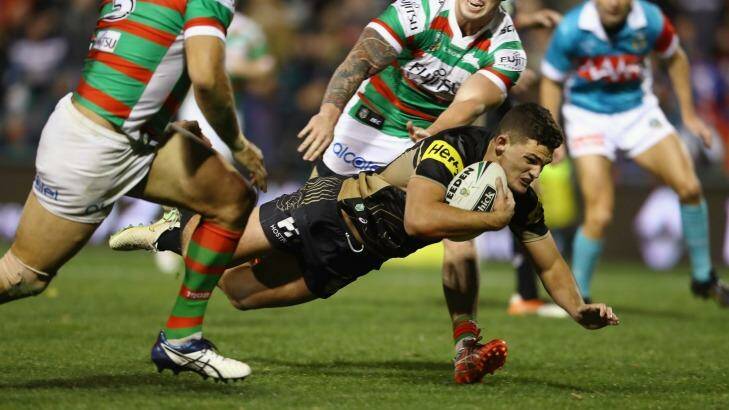 Staying put:  Nathan Cleary celebrates a Panthers try against the Rabbitohs. Photo: Mark Kolbe