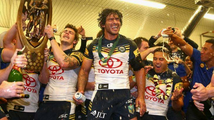 Tuning in: Johnathan Thurston and the Cowboys drew a big audience to watch their grand final win over the Brisbane Broncos on Sunday. Photo: Cameron Spencer