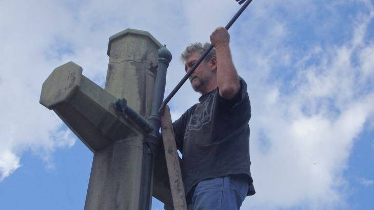 Jim Dowling and Tim Webb of the Catholic Worker movement vandalised the Cross of Sacrifice on Ash Wednesday. Photo: Supplied