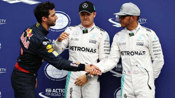 Ricciardo with Mercedes' Nico Rosberg of Germany and Lewis Hamilton of Great Britain. Photo: Mark Thompson