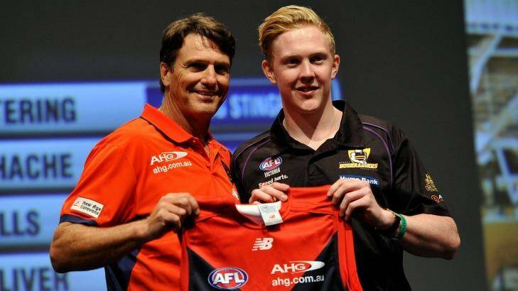 Melbourne coach Paul Roos with draft pick four Clayton Oliver. Photo: David Mariuz