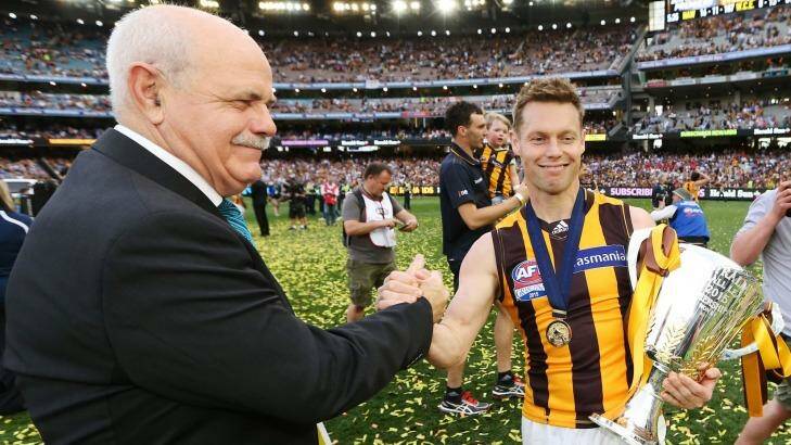 Leigh Matthews congratulates Sam Mitchell after the grand final on Saturday. Photo: AFL Media/Getty Images