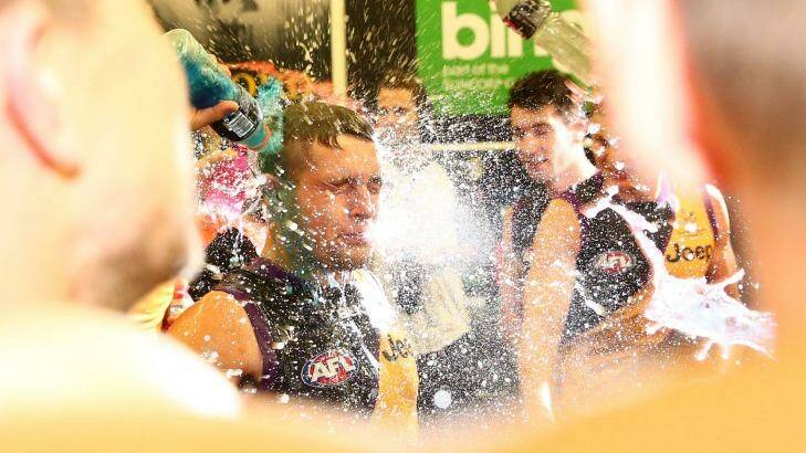Tiger time: Richmond celebrate in the rooms on Saturday night. Photo: AFL Media/Getty Images