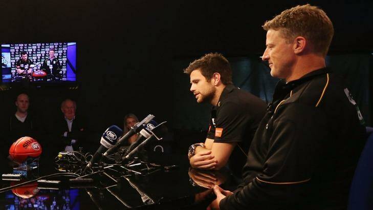 Richmond captain Trent Cotchin and coach Damien Hardwick speak to the media on Monday. Photo: Gettyy Images