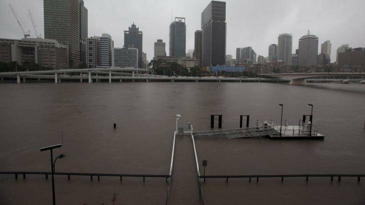 The Brisbane River inundates the South Bank CityCat terminal, near the Cafe San Marco site, during the 2011 floods.  Photo: Paul Harris